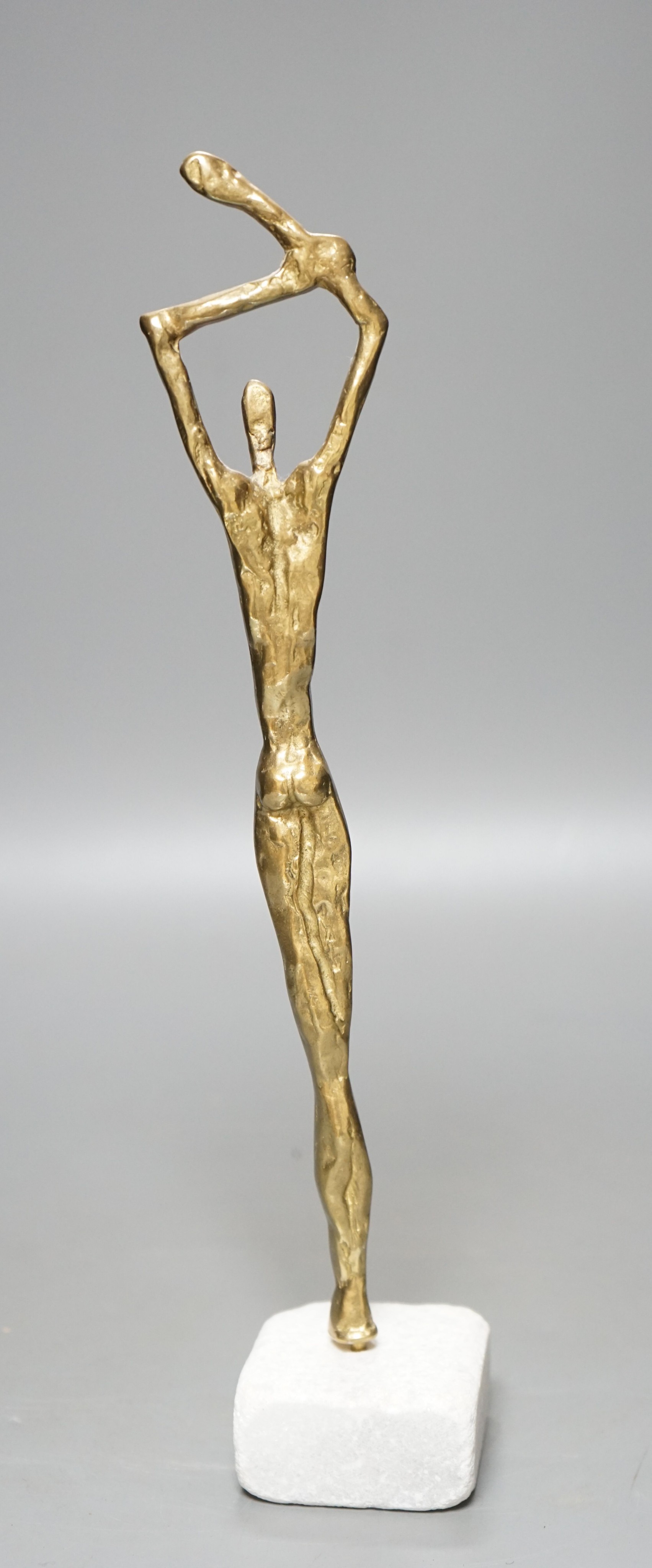 After Giacometti, an abstract bronze figure 33cm